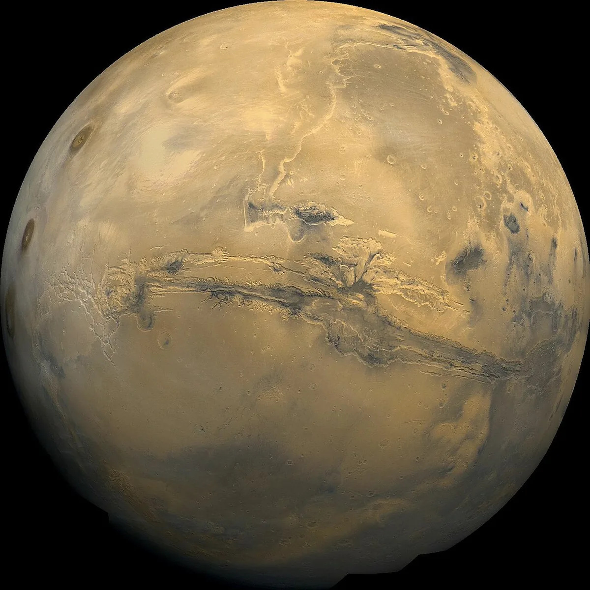Mosaïque globale de Mars montrant le vaste système de canyons Valles Marineris entaillant la surface rouge sur des milliers de kilomètres