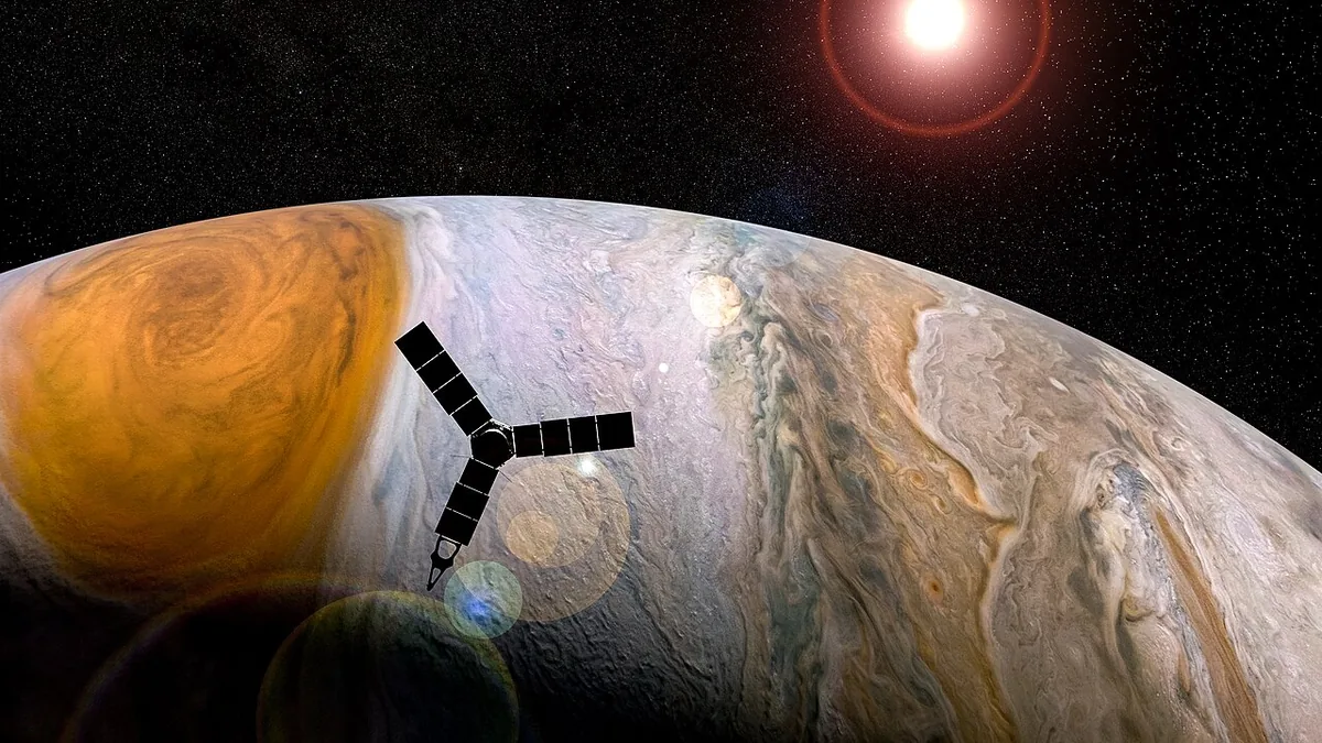 Vue d'artiste de la sonde Juno de la NASA en orbite au-dessus de Jupiter et de sa Grande Tache rouge